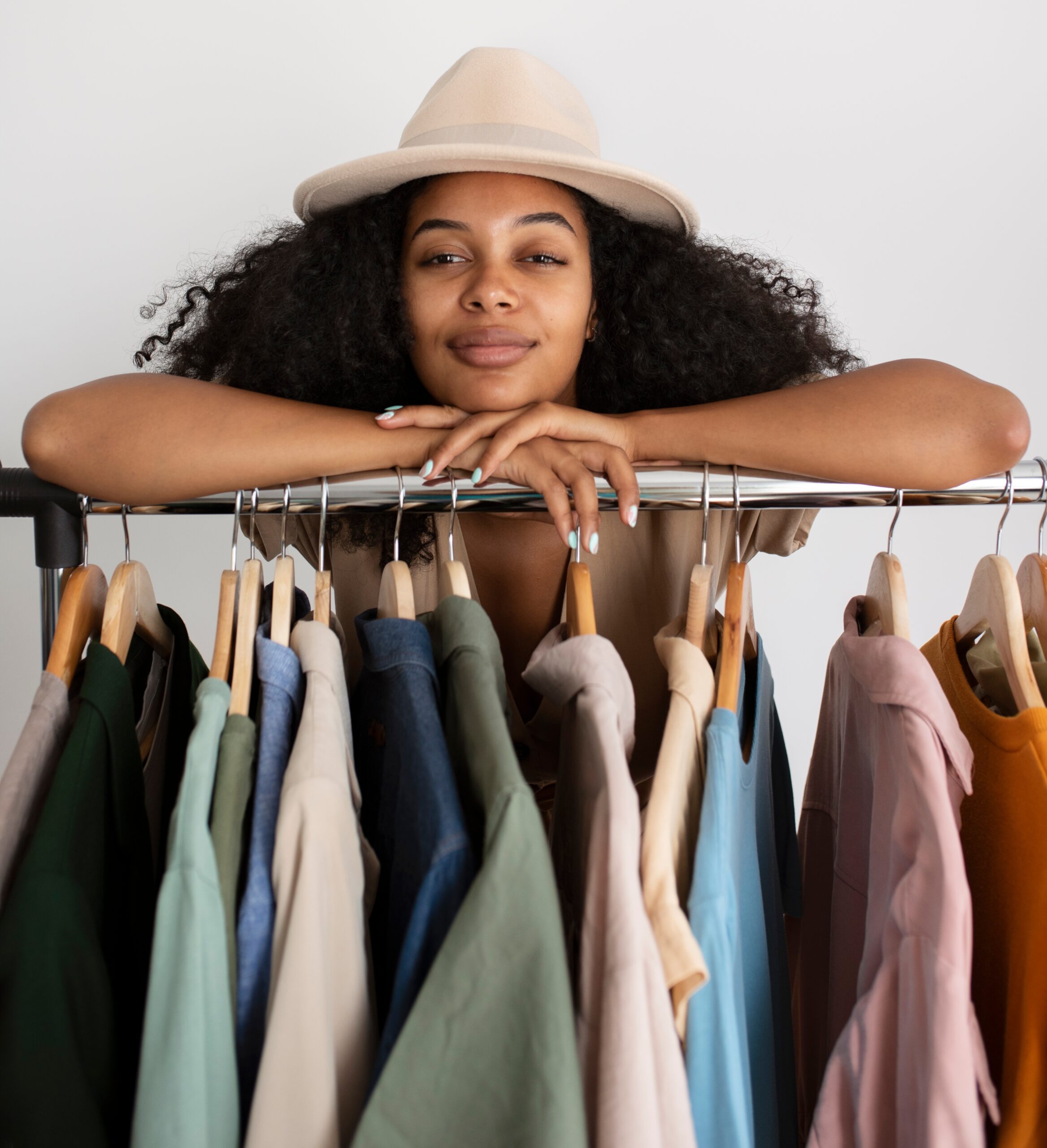 A woman feeling comfortable with her set of classy dresses