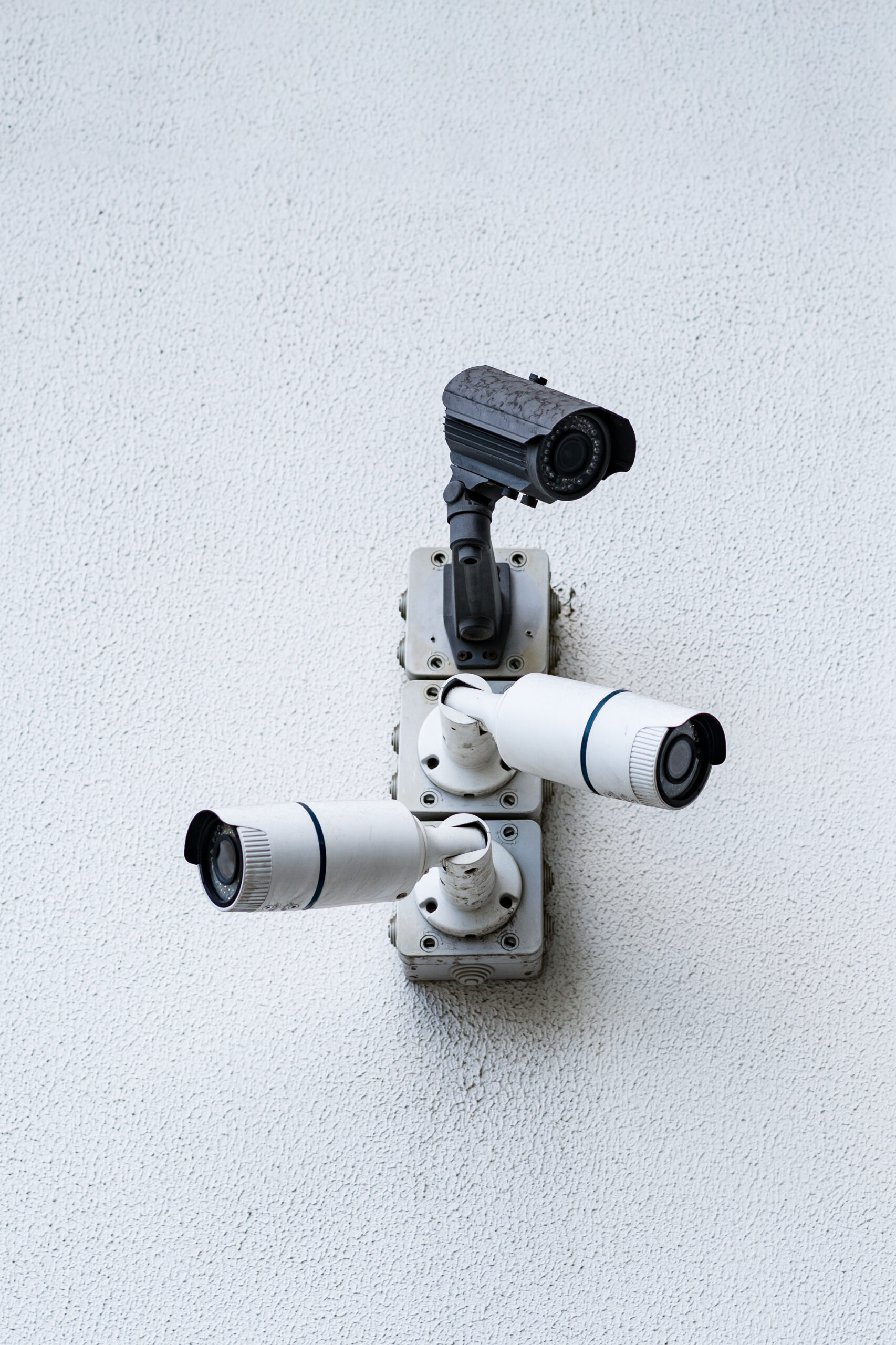 Security cameras on white modern building, technology concept for the protection of the citizens