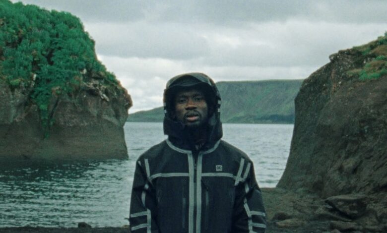 Mr Eazi performs “Corny” in a lush natural setting, singing romantic lyrics for lovers in the July 2025 music video.