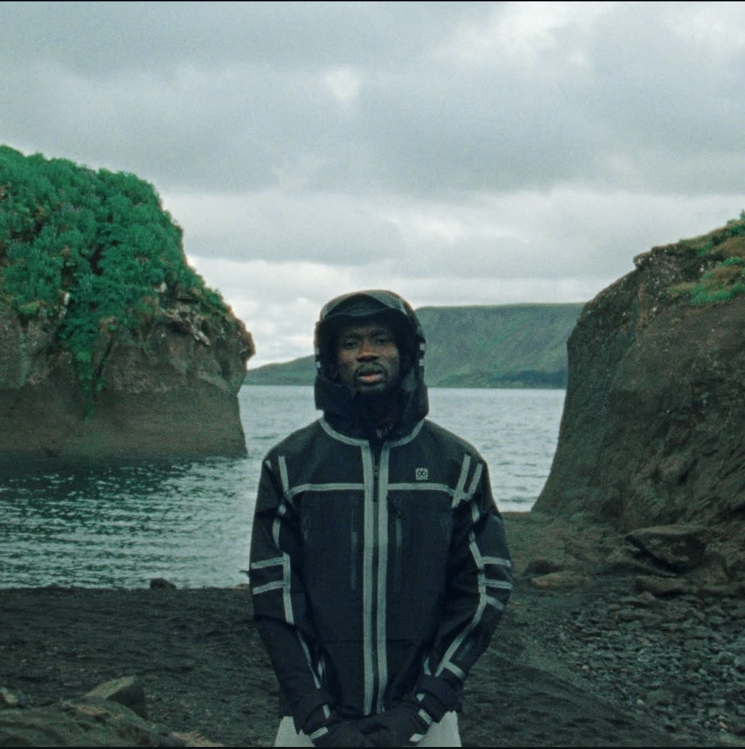 Mr Eazi performs “Corny” in a lush natural setting, singing romantic lyrics for lovers in the July 2025 music video.