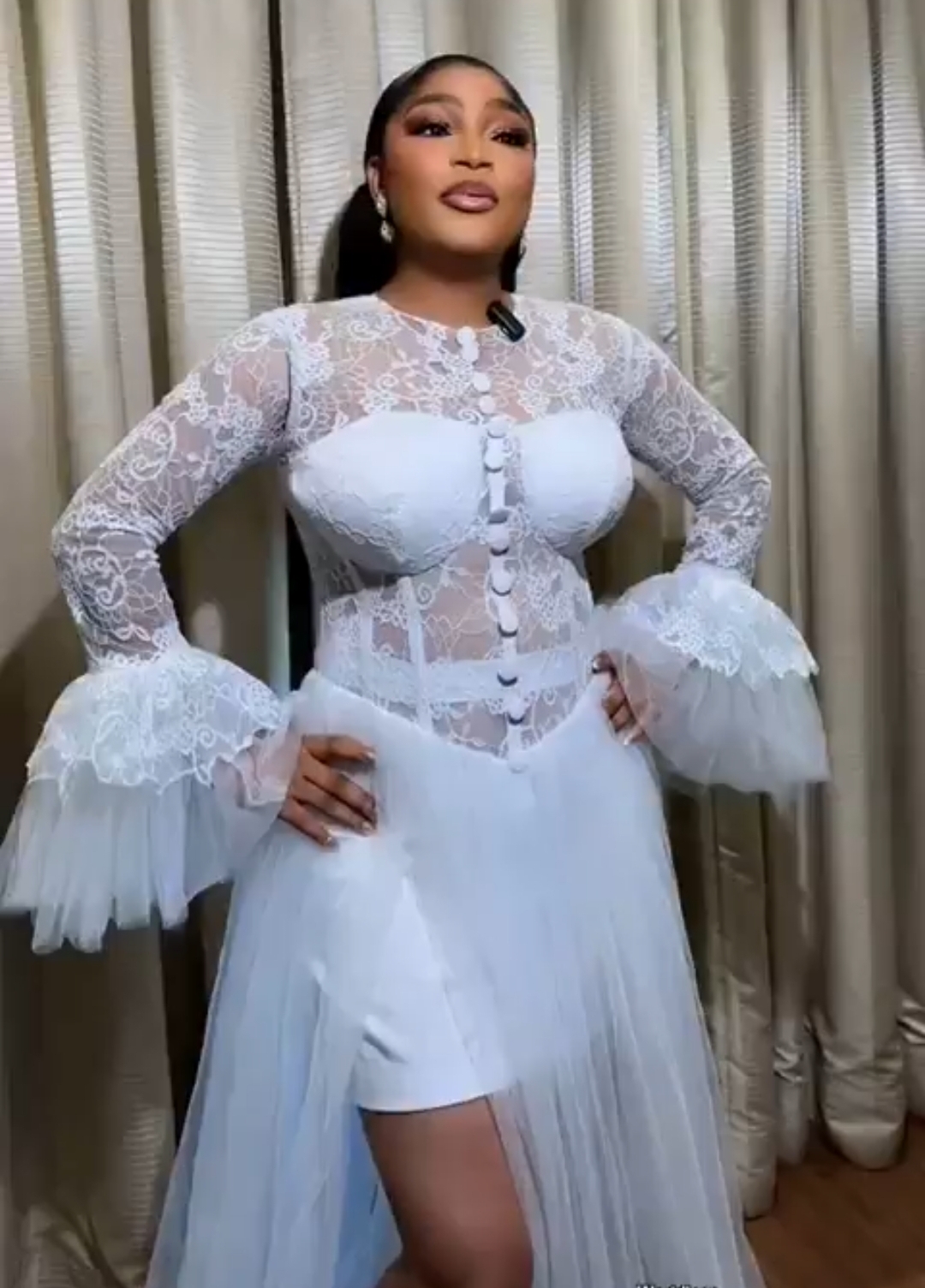Nigerian bride in wedding gown shares viral story of meeting husband while on date with ex, surrounded by friends, July 2025.