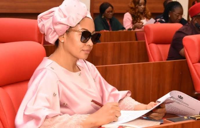 Senator Natasha Akpoti-Uduaghan speaks to journalists at National Assembly gate after blockade, July 2025.