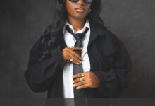 University of Ibadan Law graduate celebrates academic excellence after graduating with first class.